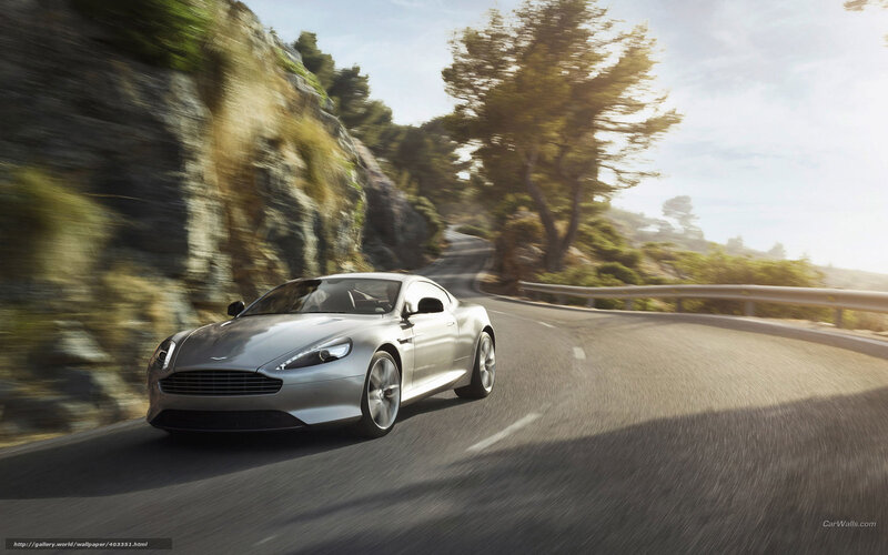 silver sports car on winding road