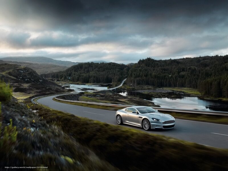 Silver sports car on winding road