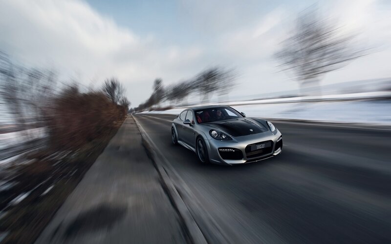 silver sports car on winter road