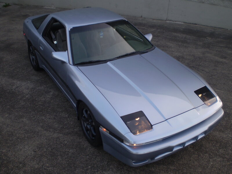 silver sports car parked