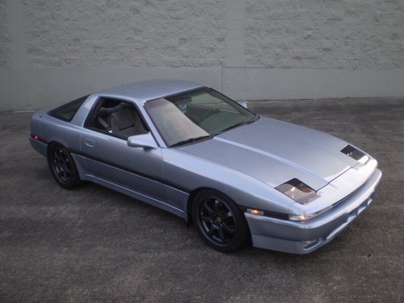 silver sports car parked