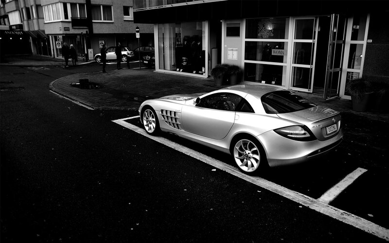 Silver sports car parked on street