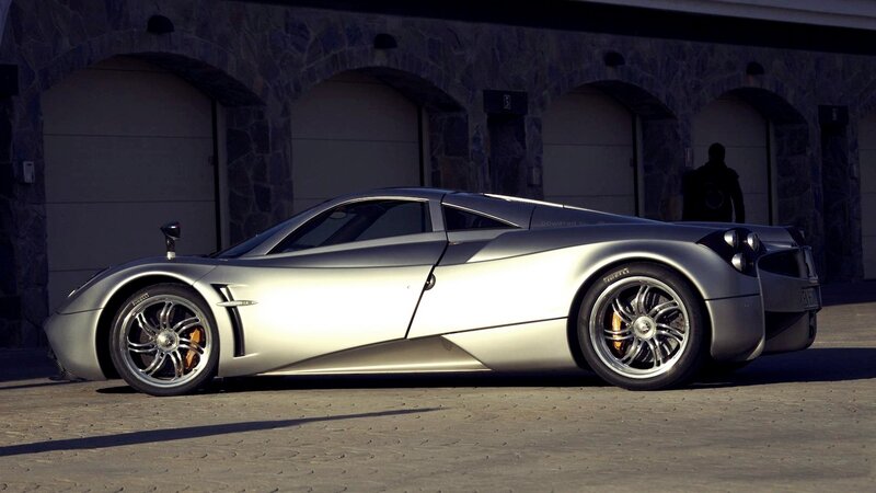 silver sports car parked outside