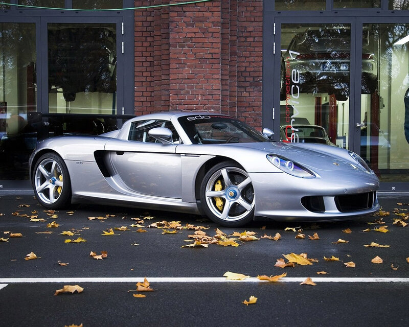 Silver sports car parked outside