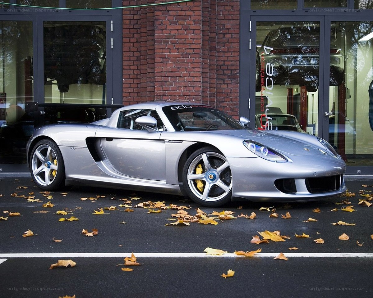 Silver sports car parked outside