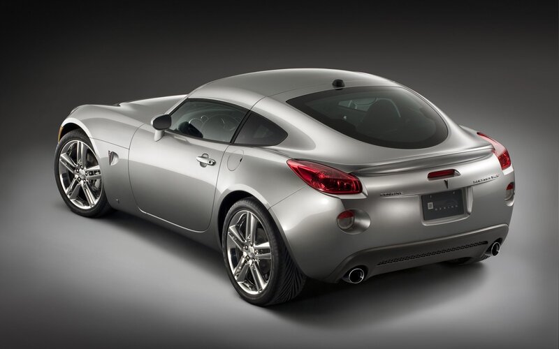 silver sports car rear view