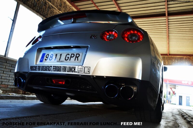 silver sports car rear view