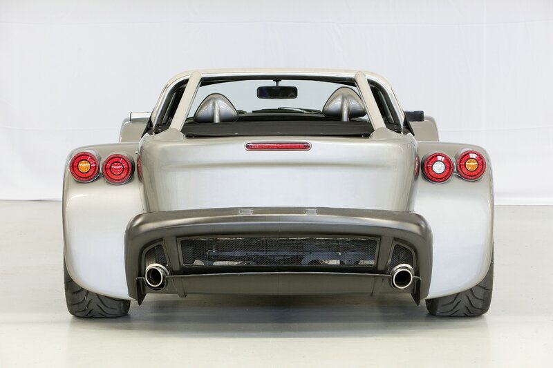silver sports car rear view