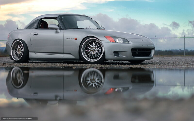 silver sports car reflection