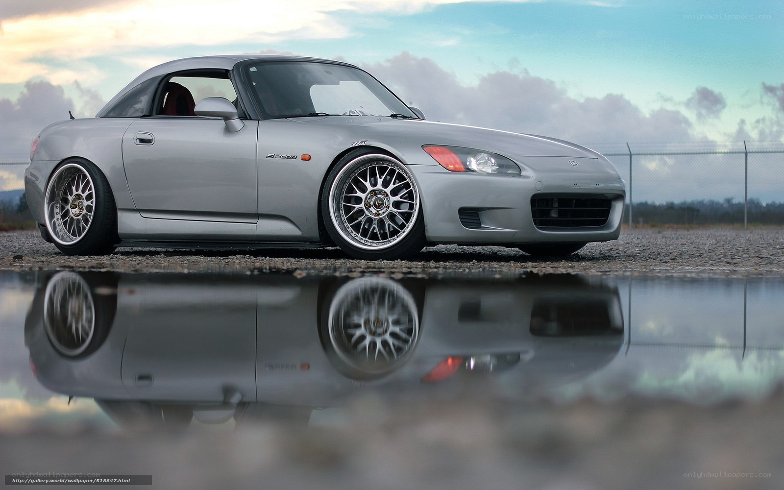 silver sports car reflection