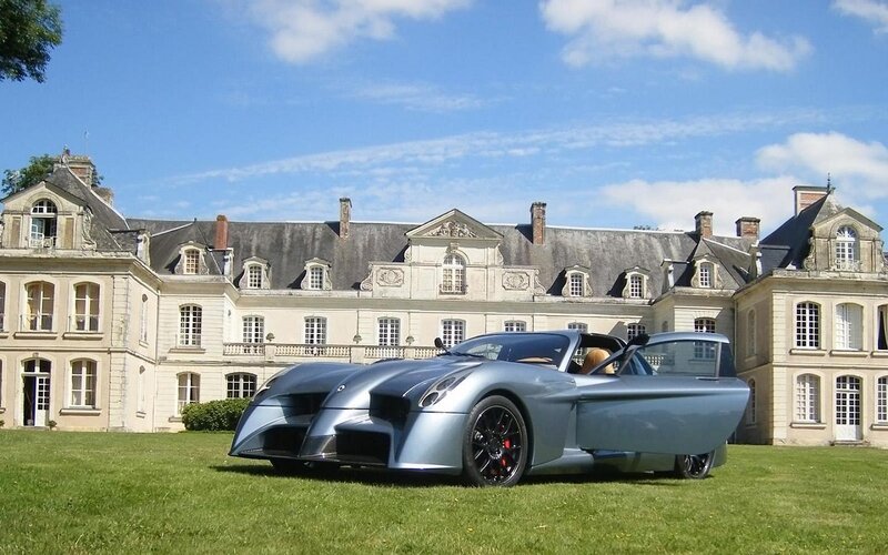 Silver Sports Car — Serene, Afternoon, Photograph, Building