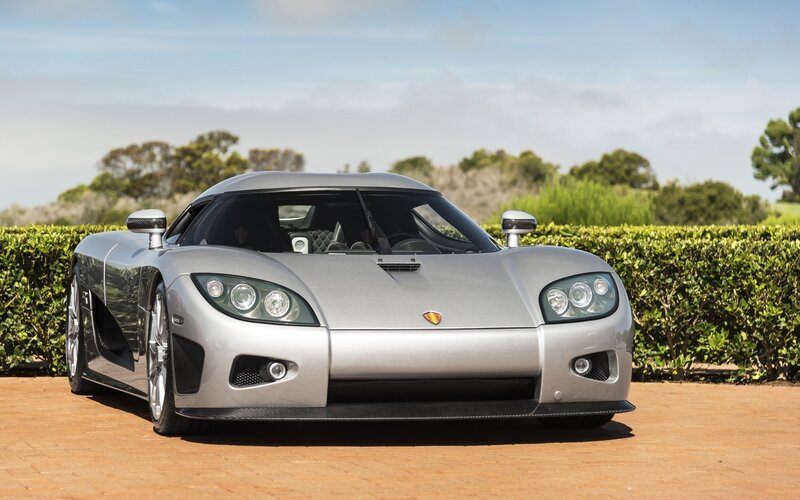 Silver Sports Car — Serene, Afternoon, Photograph, Hedge