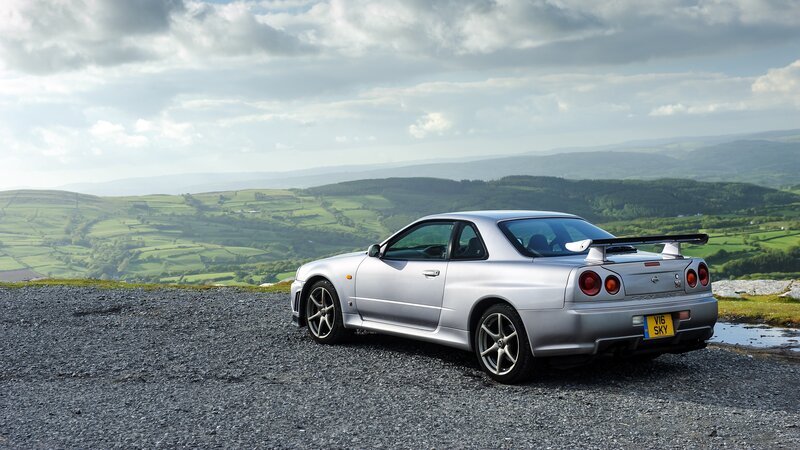 Silver Sports Car — Serene, Afternoon, Photograph, Hills, Sky