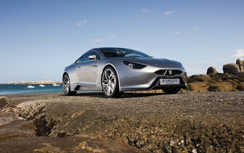 Silver Sports Car — Serene, Afternoon, Photograph, Ocean