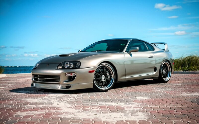 Silver Sports Car — Serene, Afternoon, Photograph, Pavement
