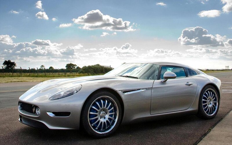 Silver Sports Car — Serene, Afternoon, Photograph, Road, Clouds