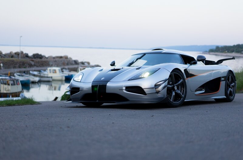 Silver Sports Car — Serene, Sunset, Photograph, Boats