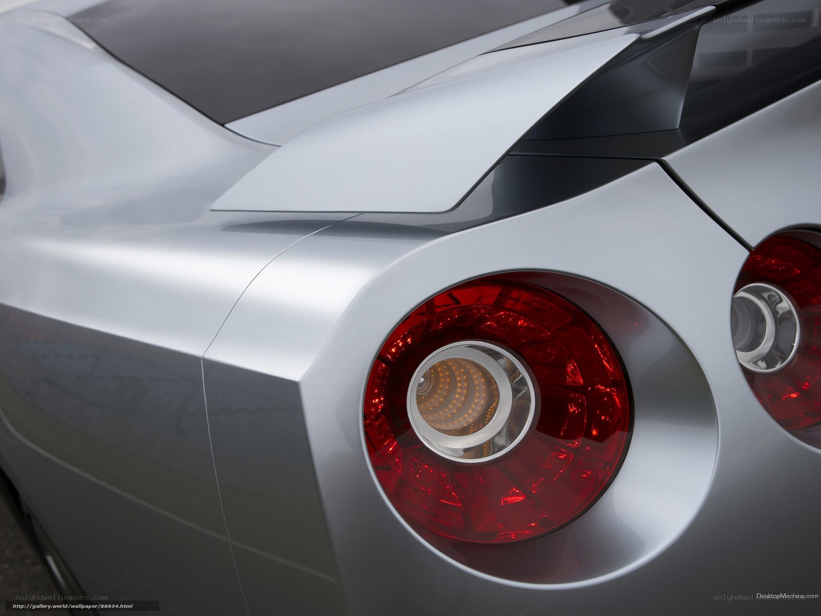 silver sports car taillight