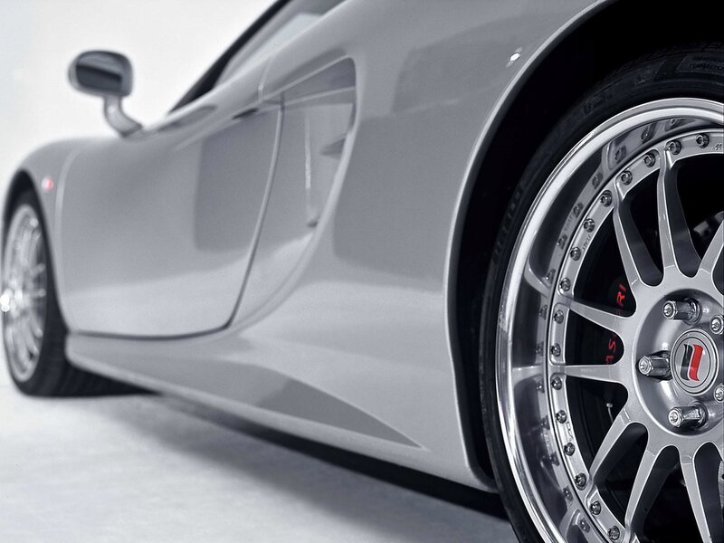 silver sports car wheel