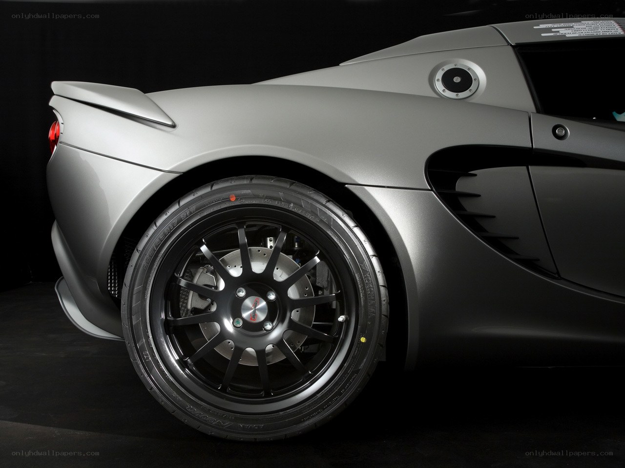 silver sports car wheel
