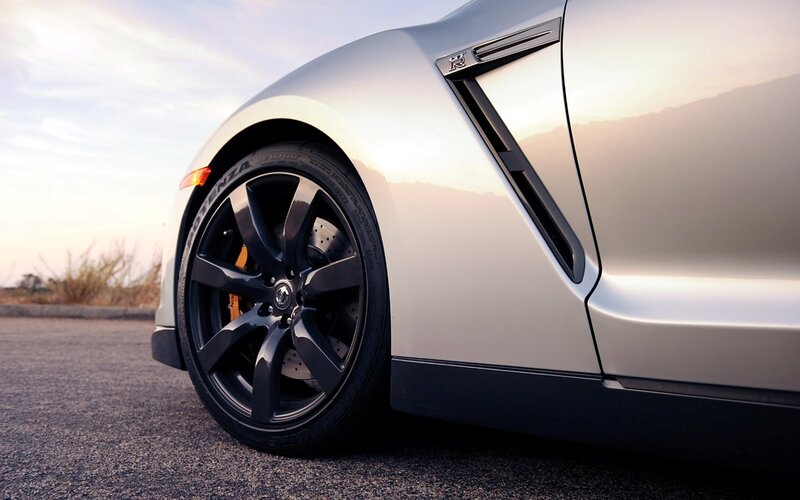 silver sports car wheel