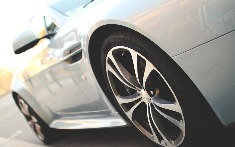 Silver Sports Car Wheel — Calm, Sunset