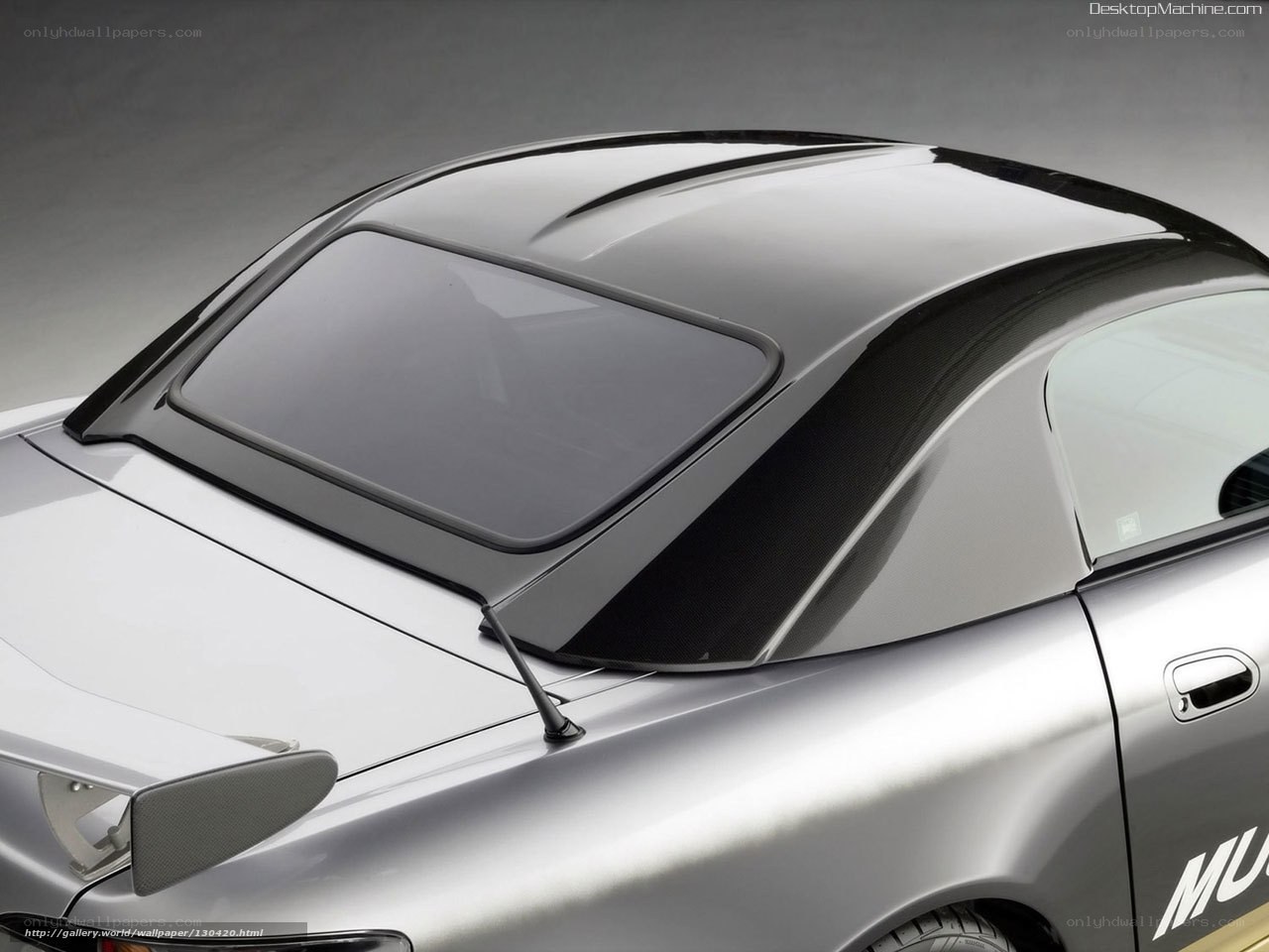 silver sports car with carbon fiber roof