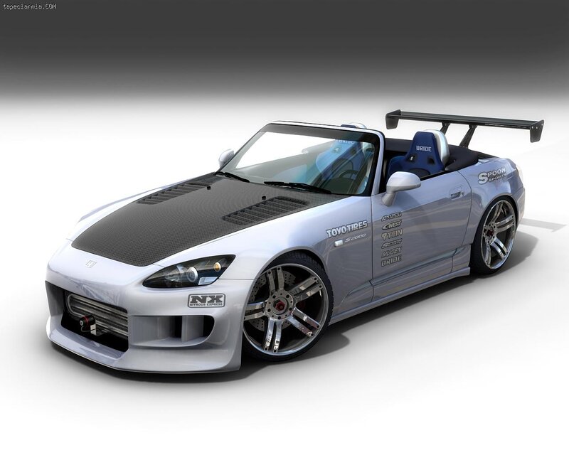 silver sports car with carbon hood