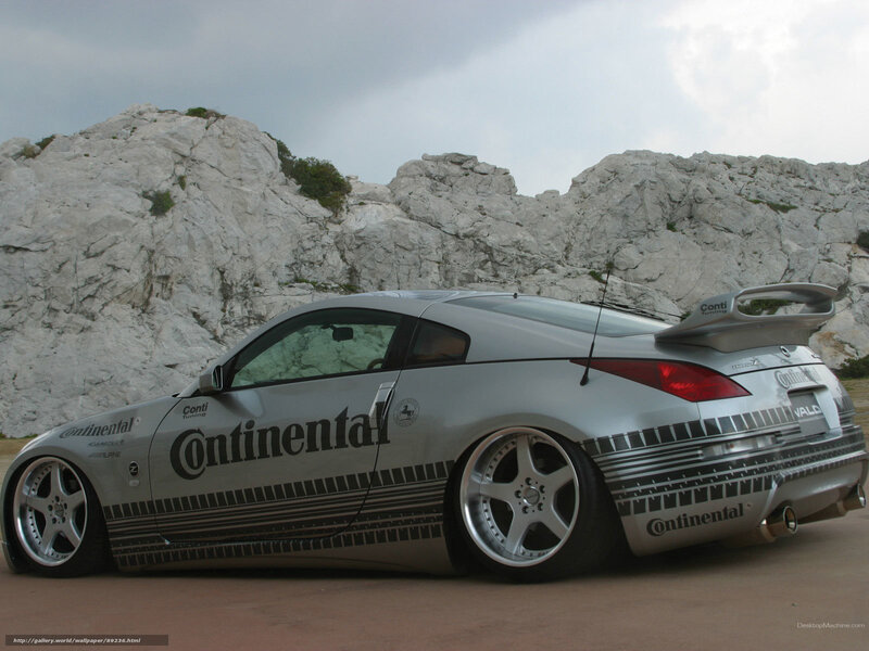silver sports car with continental branding