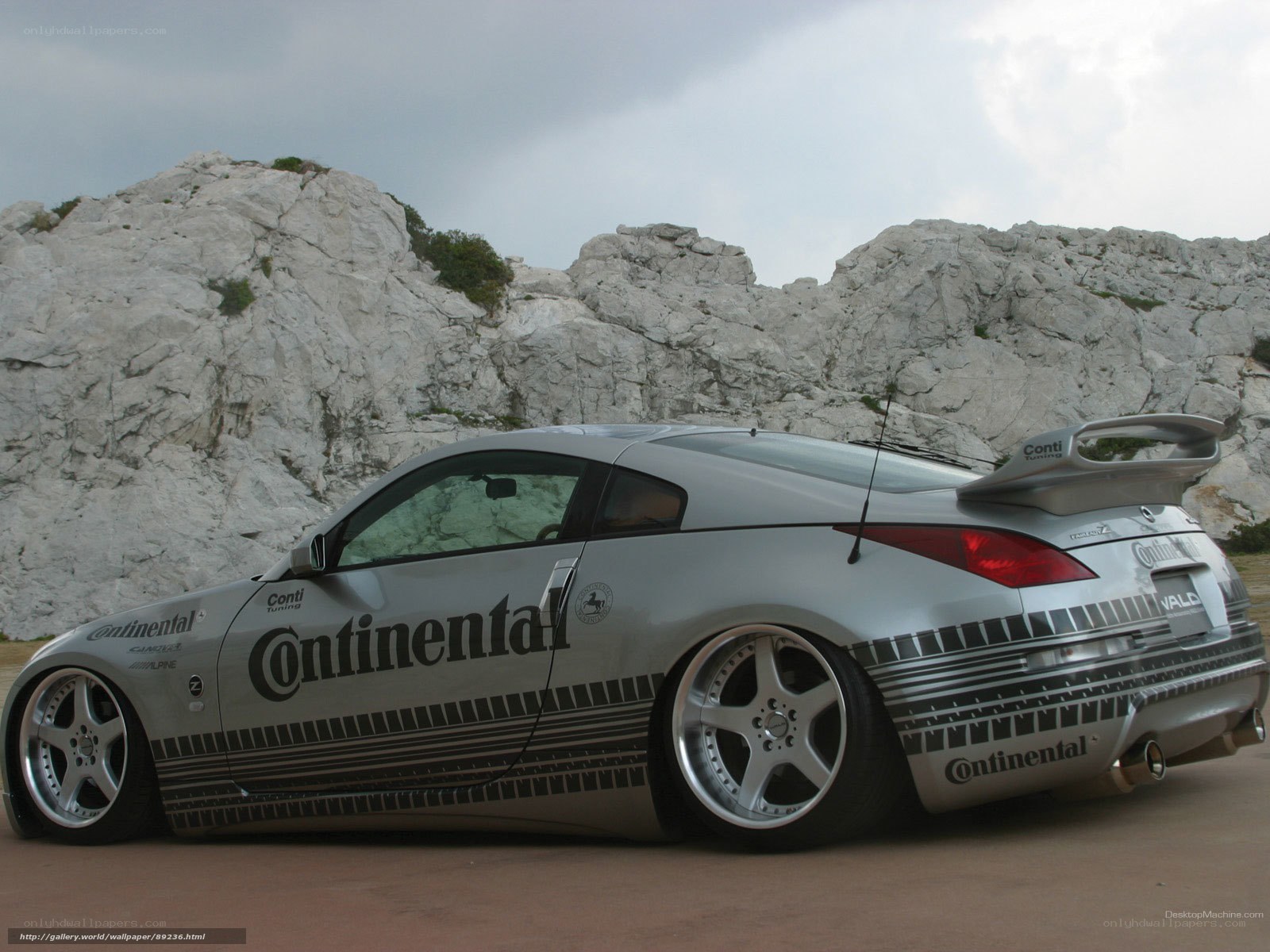 silver sports car with continental branding