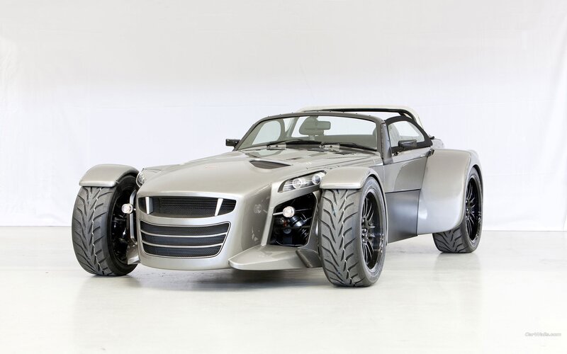 silver sports car with exposed wheels