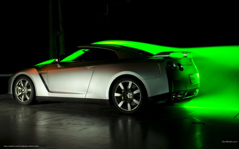 silver sports car with green light