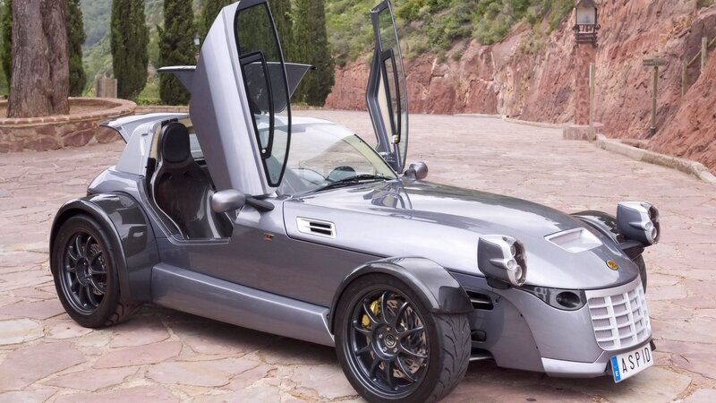 Silver sports car with gullwing doors