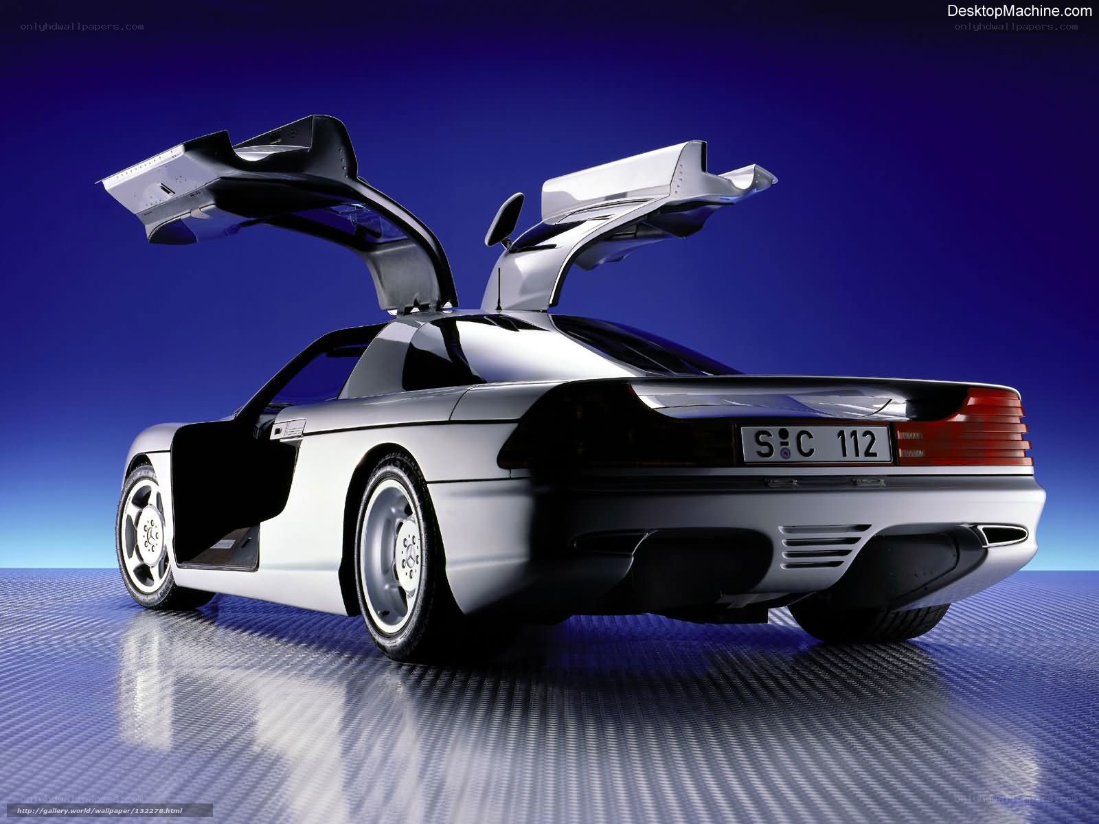 Silver sports car with gullwing doors