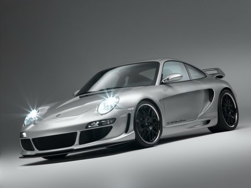 silver sports car with headlights
