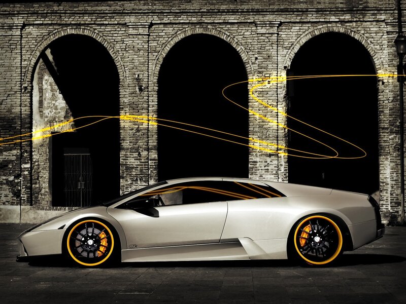 Silver sports car with light trails