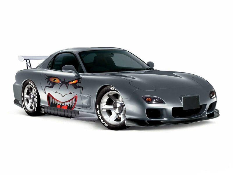 silver sports car with monster graphic