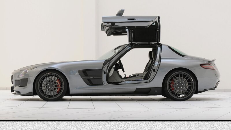silver sports car with open door