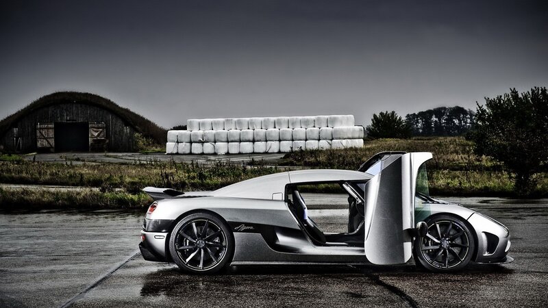 silver sports car with open door