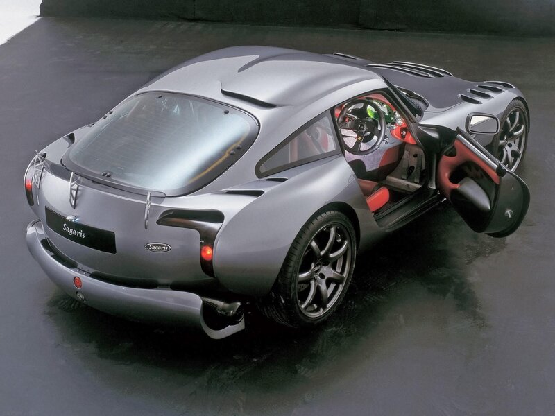 Silver sports car with open door