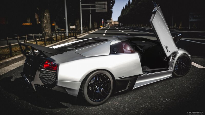 silver sports car with open door