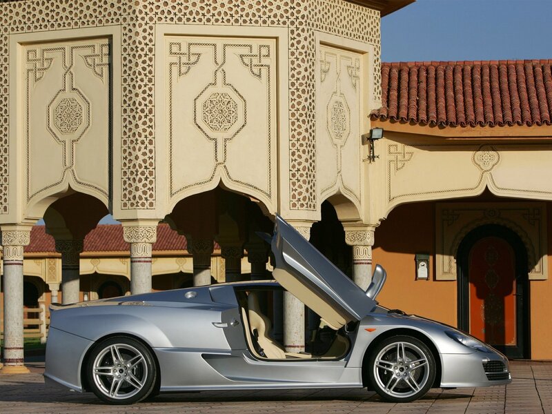 Silver sports car with open door