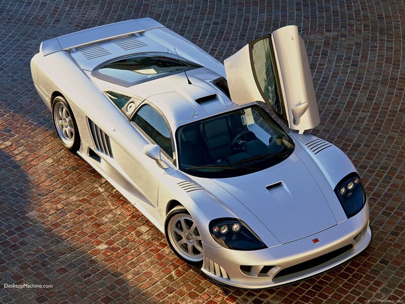 silver sports car with open door