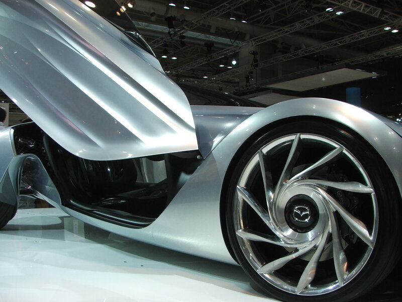 Silver sports car with open door