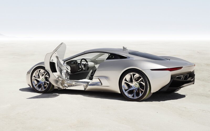 Silver sports car with open door