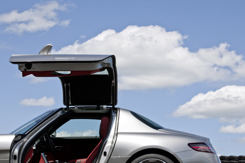 Silver sports car with open door