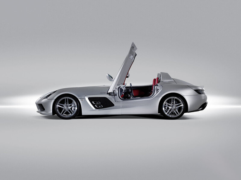 Silver sports car with open door