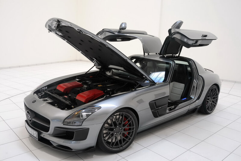 silver sports car with open doors