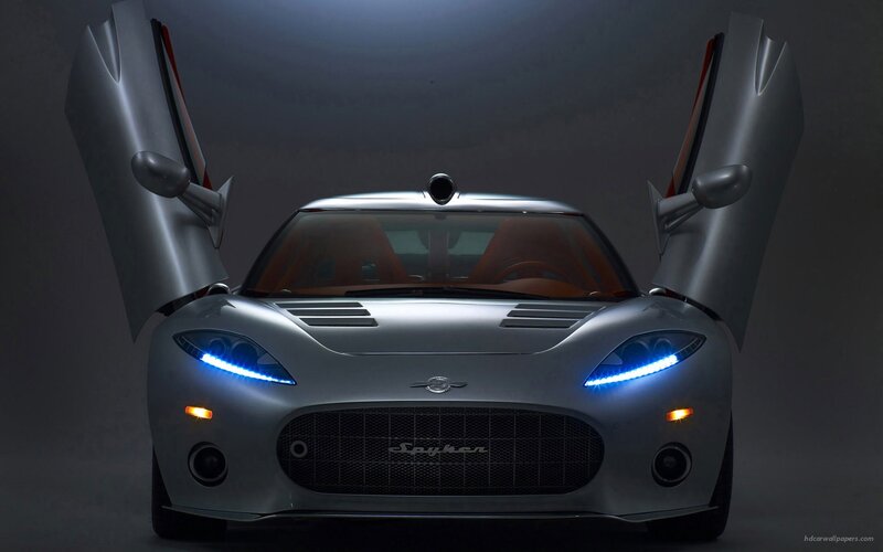 silver sports car with open doors