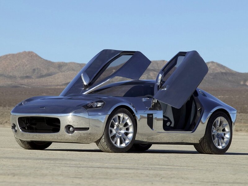 silver sports car with open doors
